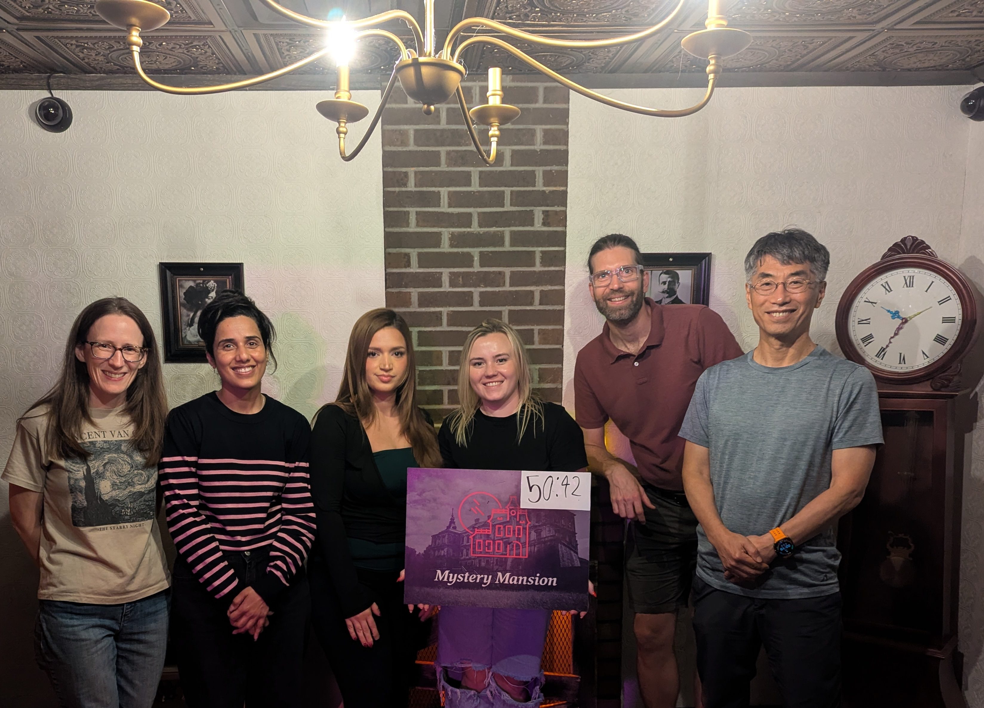The image shows members of the Engelke lab who just solved a breakout room.